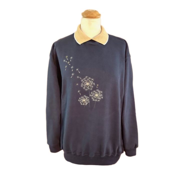Ladies navy sweatshirt with dandelion design