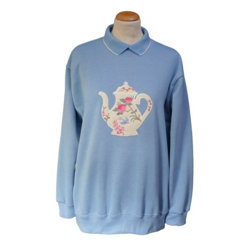 Blue ladies sweatshirt with floral teapot design