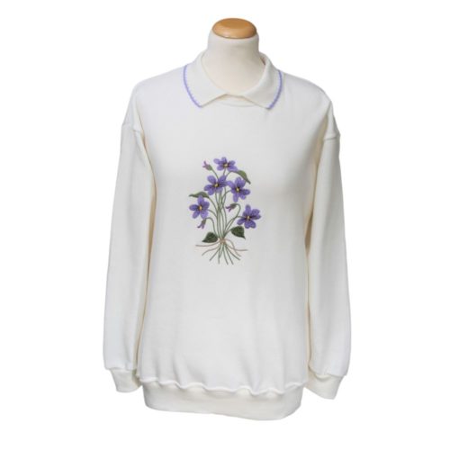 Ladies white sweatshirt with embroided purple floral pattern on front
