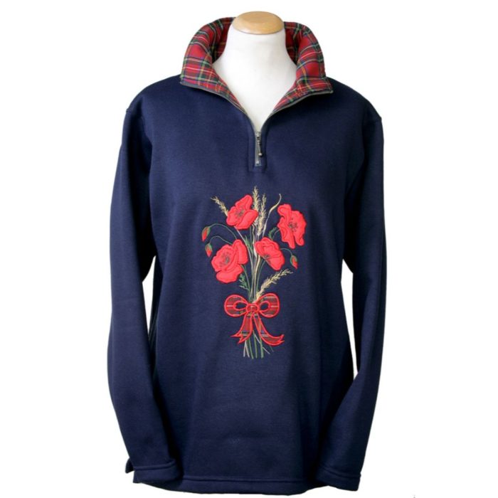 Ladies 1/4 zip navy fleece with tartan pattern and floral design on the front