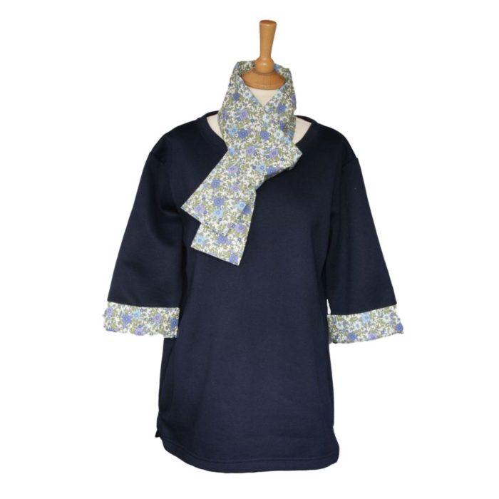 Ladies navy tunic with floral patterned scarf and cuffs